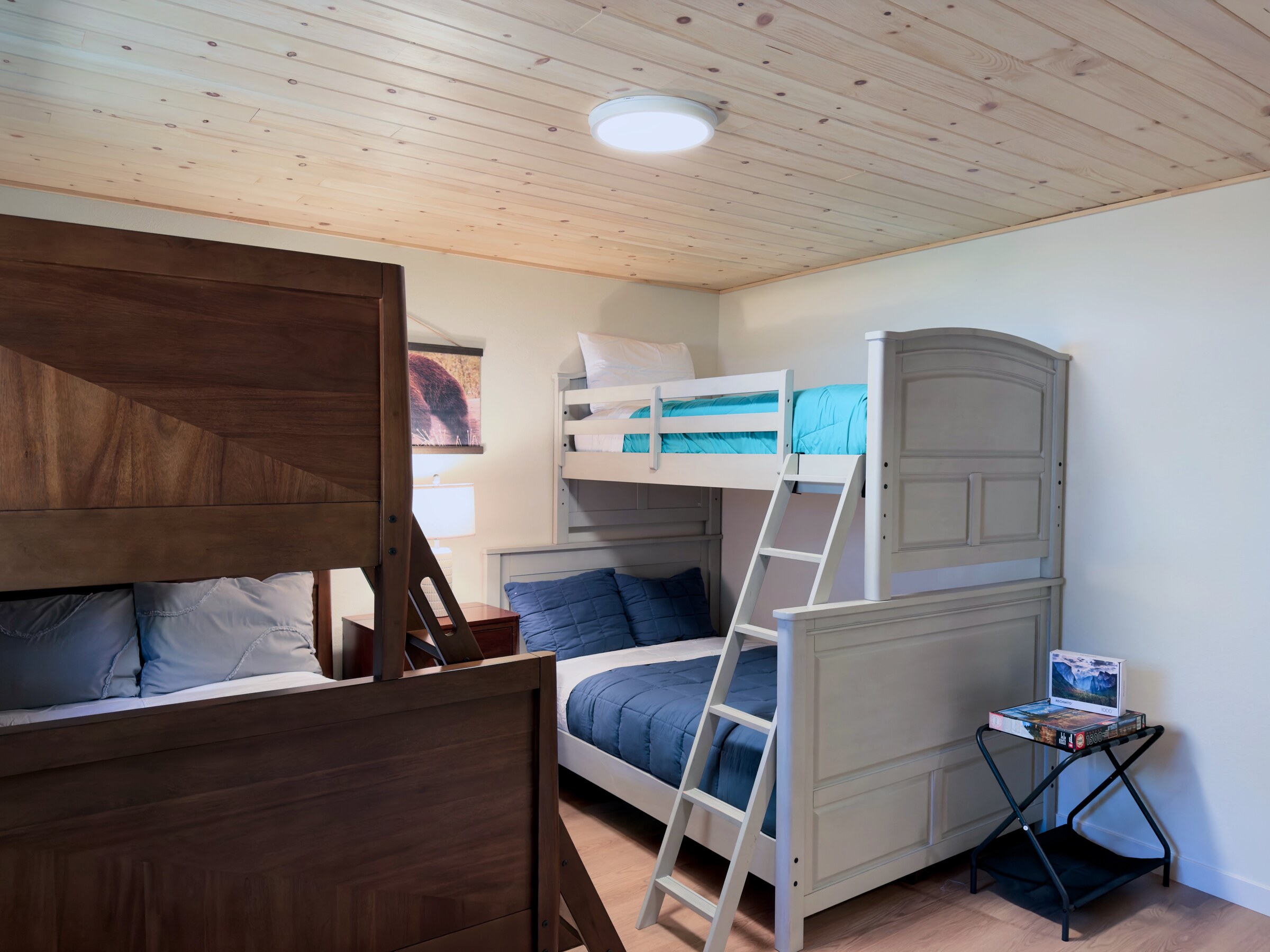 Bunk room — wooden bunks with ladder, sleeps four